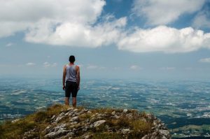 mountain top man listening