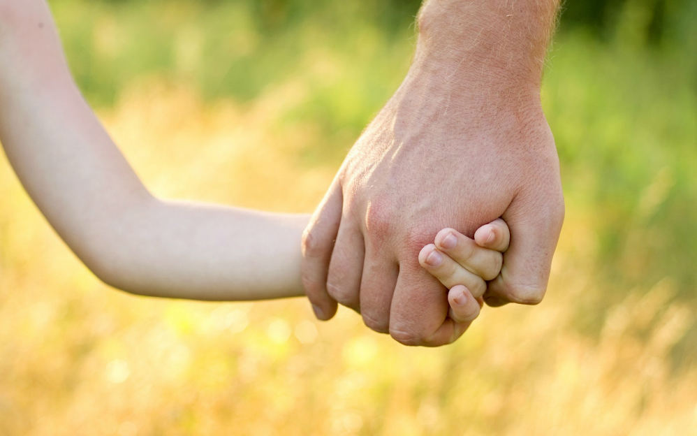 Godly Father holding hands Dad